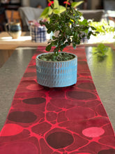 Load image into Gallery viewer, Red Stone Charmeuse Silk 72x14” bold fun. This beautiful silk makes a unique dresser cover and scarf