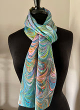 Load image into Gallery viewer, Double marbled  blue orange pink  Charmeuse  Silk 72x14” bold fun. This beautiful silk makes a unique dresser cover and scarf