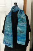 Load image into Gallery viewer, Blue feather  water marbled 8mm Habotai silk.  Hang on the wall, use as a table runner or wear this unique piece