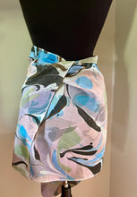 Load image into Gallery viewer, Blue greens purple neutral  twice marbled shawl. .  Crepe de chine 72x22 ” bold fun.    This beautiful silk makes a unique dresser cover. and scarf
