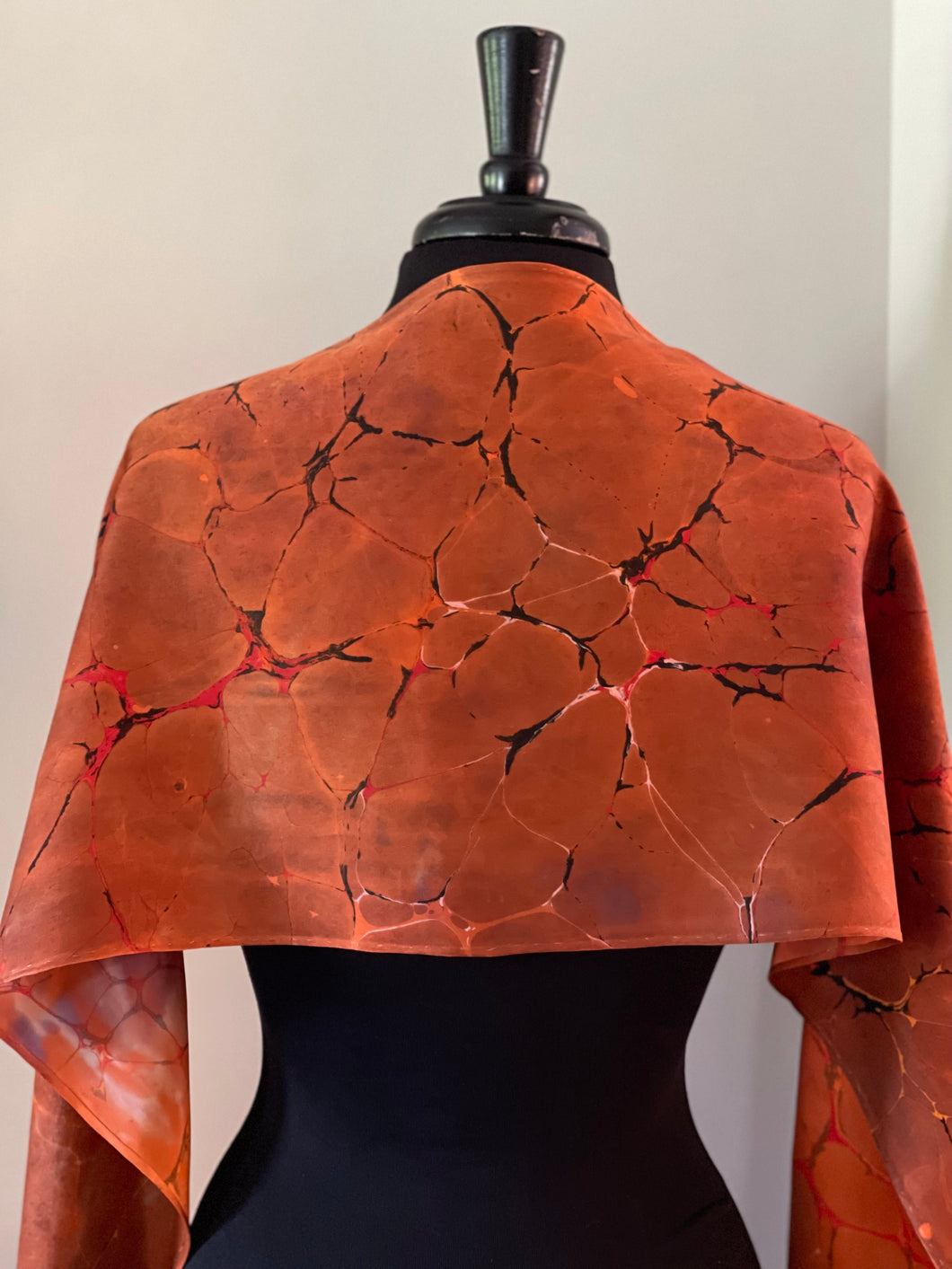 Orange  Italian Vein marbled  Charmeuse  Silk 72x14” bold fun. This beautiful silk makes a unique dresser cover and scarf