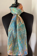 Load image into Gallery viewer, Double marbled  blue orange pink  Charmeuse  Silk 72x14” bold fun. This beautiful silk makes a unique dresser cover and scarf
