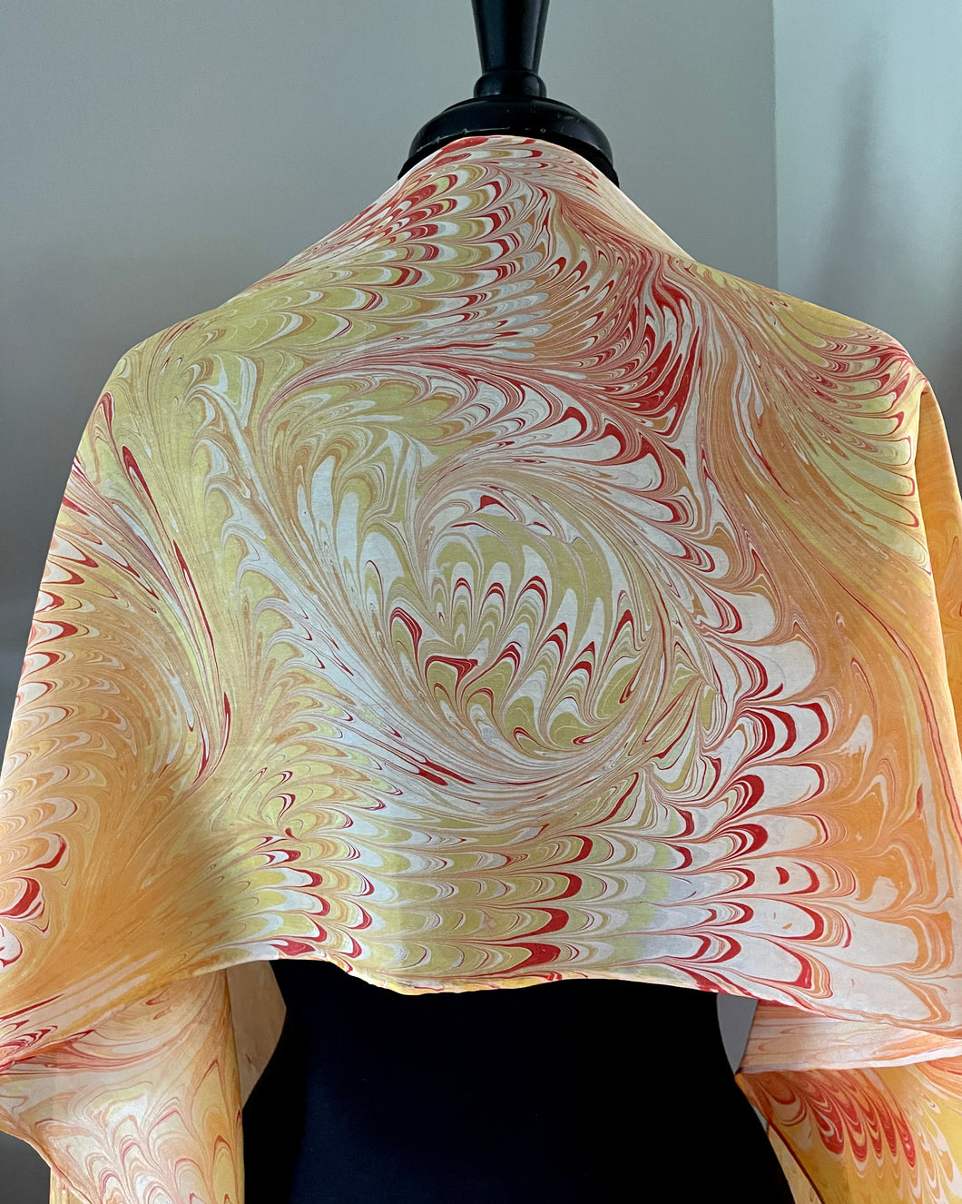 Orange yellow water marbled 8mm Habotai silk.  Hang on the wall, use as a table runner or wear this unique piece
