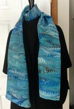 Load image into Gallery viewer, Blue feather  water marbled 8mm Habotai silk.  Hang on the wall, use as a table runner or wear this unique piece

